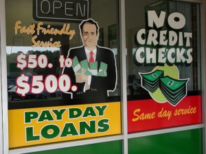 payday loans window sign